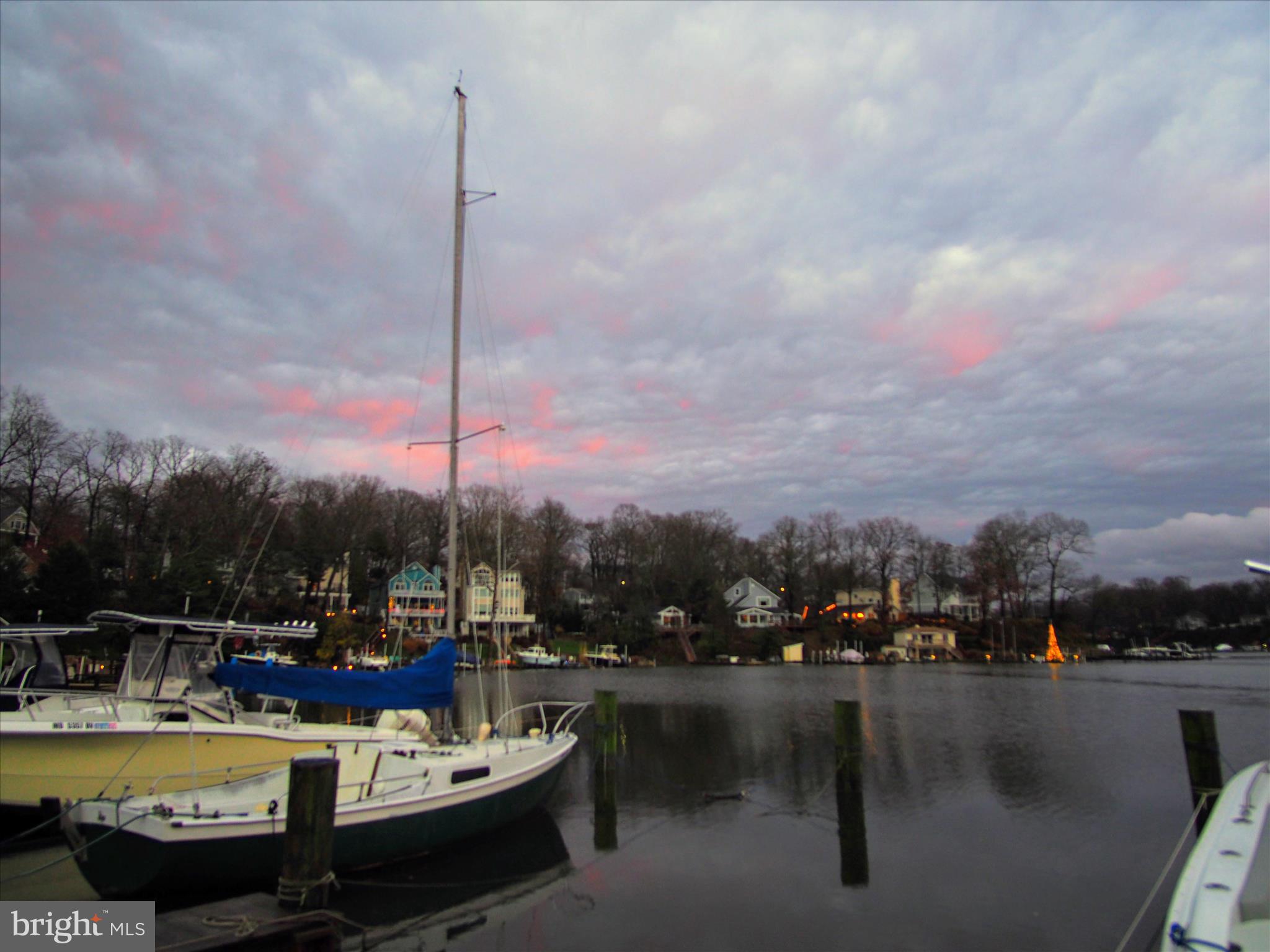 620 Jumpers Hole Road Severna Park, MD 21146 - Photo 41 of 43 a view of a lake with chairs