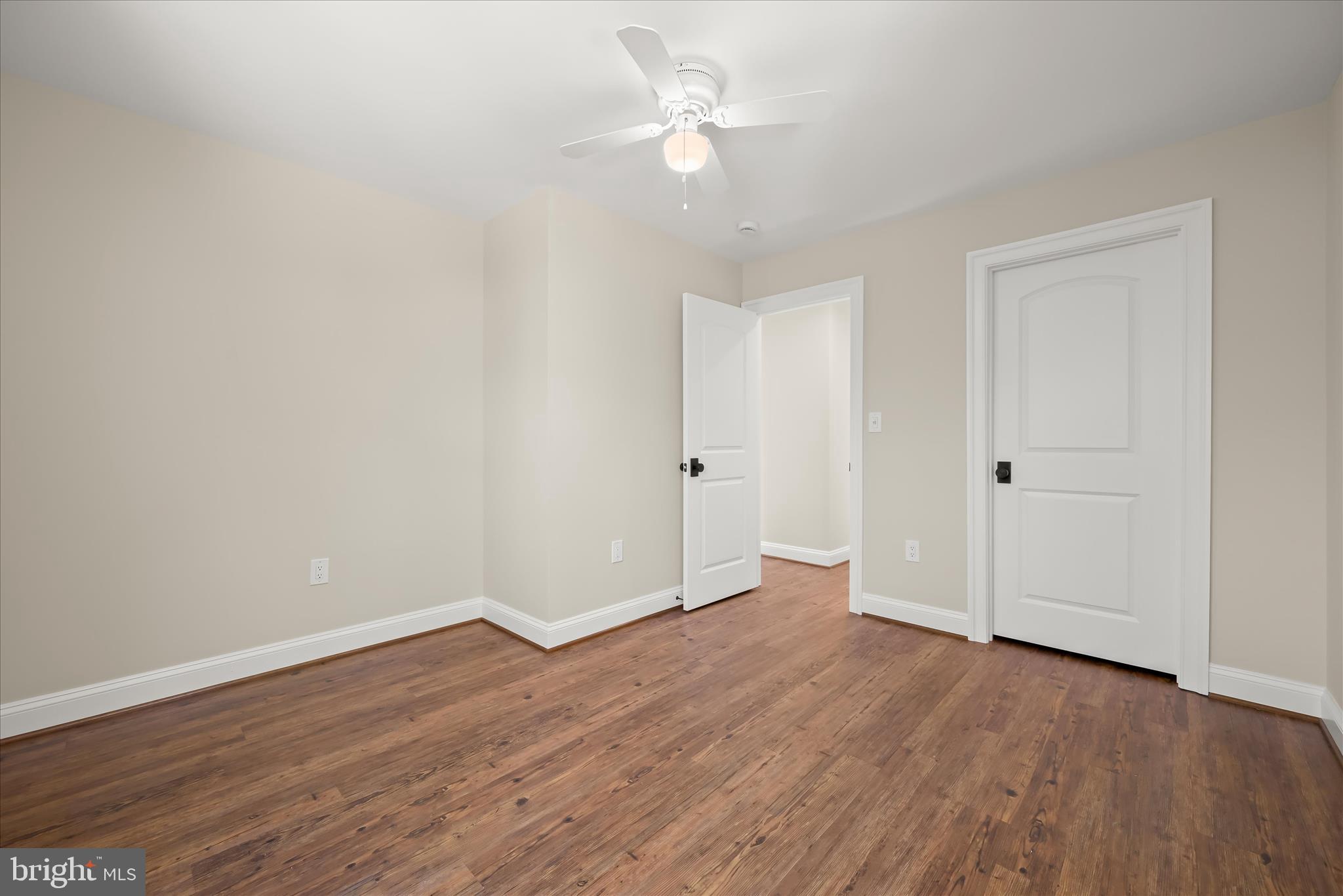 620 Jumpers Hole Road Severna Park, MD 21146 - Photo 57 of 112 a view of an empty room with wooden floor