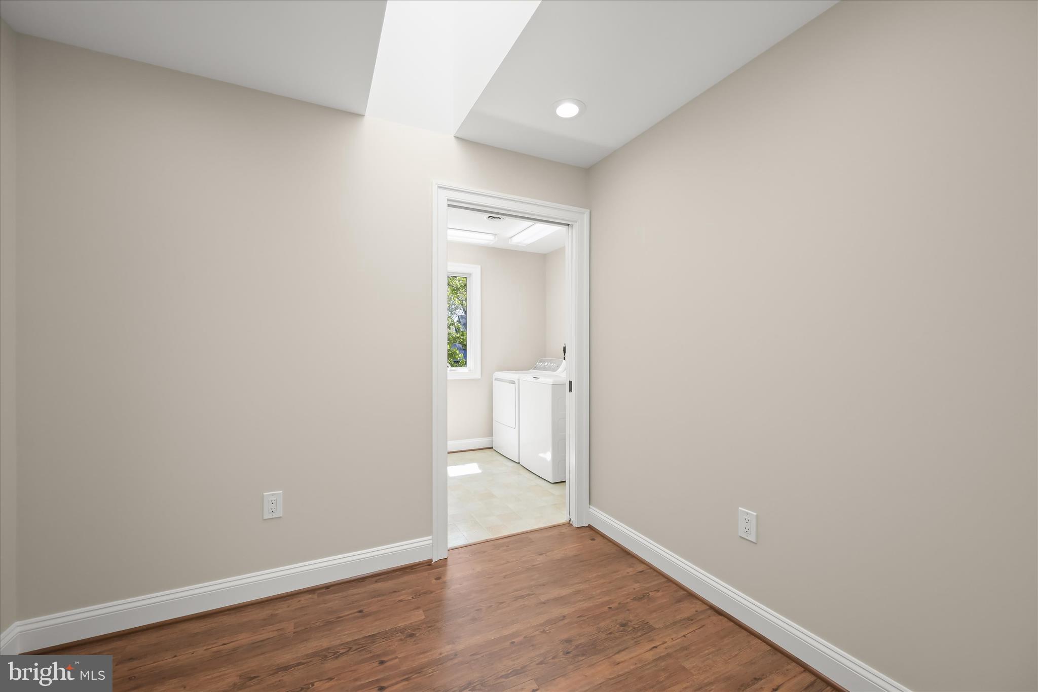 620 Jumpers Hole Road Severna Park, MD 21146 - Photo 67 of 112 a view of an empty room with wooden floor
