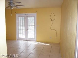 360 16th Avenue Northwest Naples, FL 34120 - Photo 4 of 6 a view of a room with windows