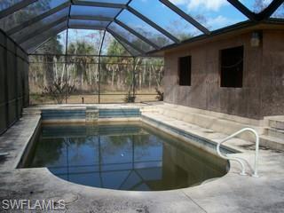 360 16th Avenue Northwest Naples, FL 34120 - Photo 6 of 6 a outdoor view of a garage