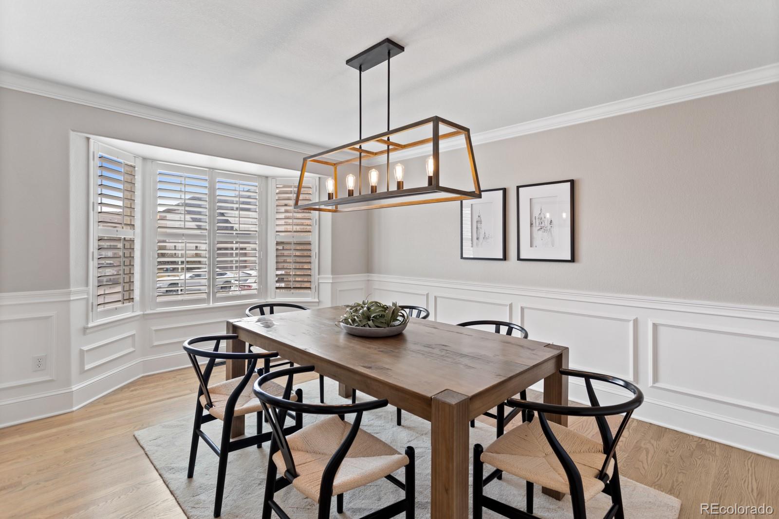 6681 Secrest Circle Arvada, CO 80007 - Photo 10 of 50 a view of a dining room with furniture window and outside view