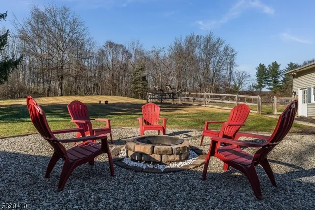 a view of a park with swings and slides