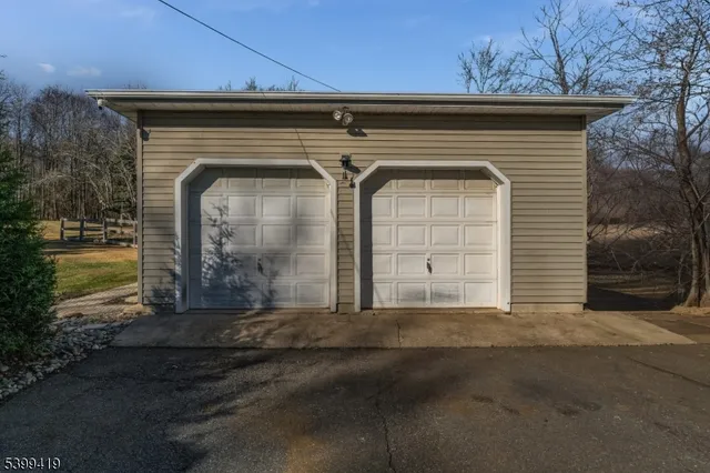 a front view of a house with garage