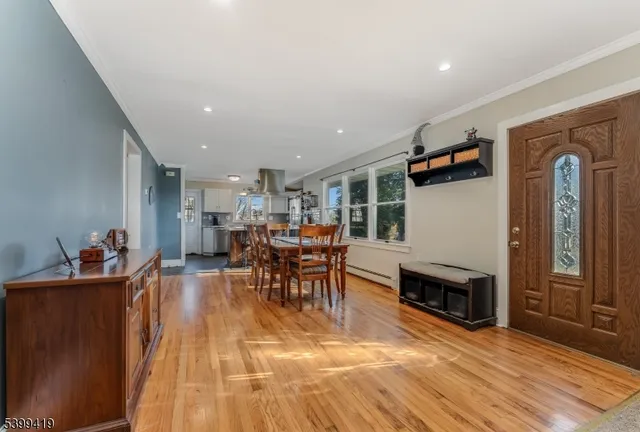 a view of a living room and dining room