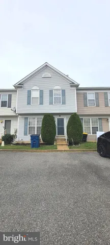 a view of a yard in front of a house