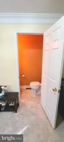 a bathroom with a toilet a sink and a bathtub