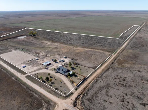 a living room with fireplace furniture and a flat screen tv