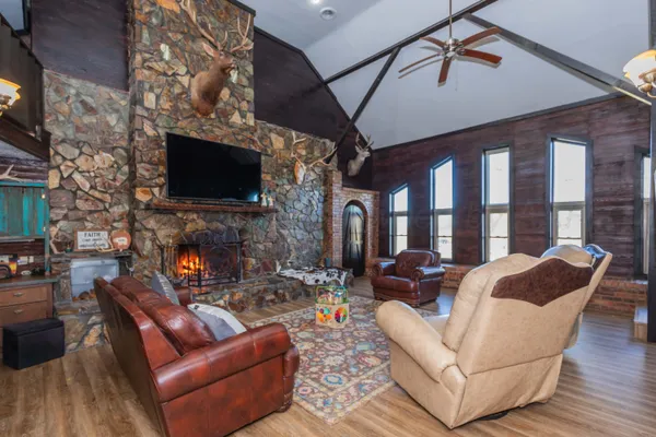 a kitchen with stainless steel appliances granite countertop a stove a sink dishwasher and cabinets