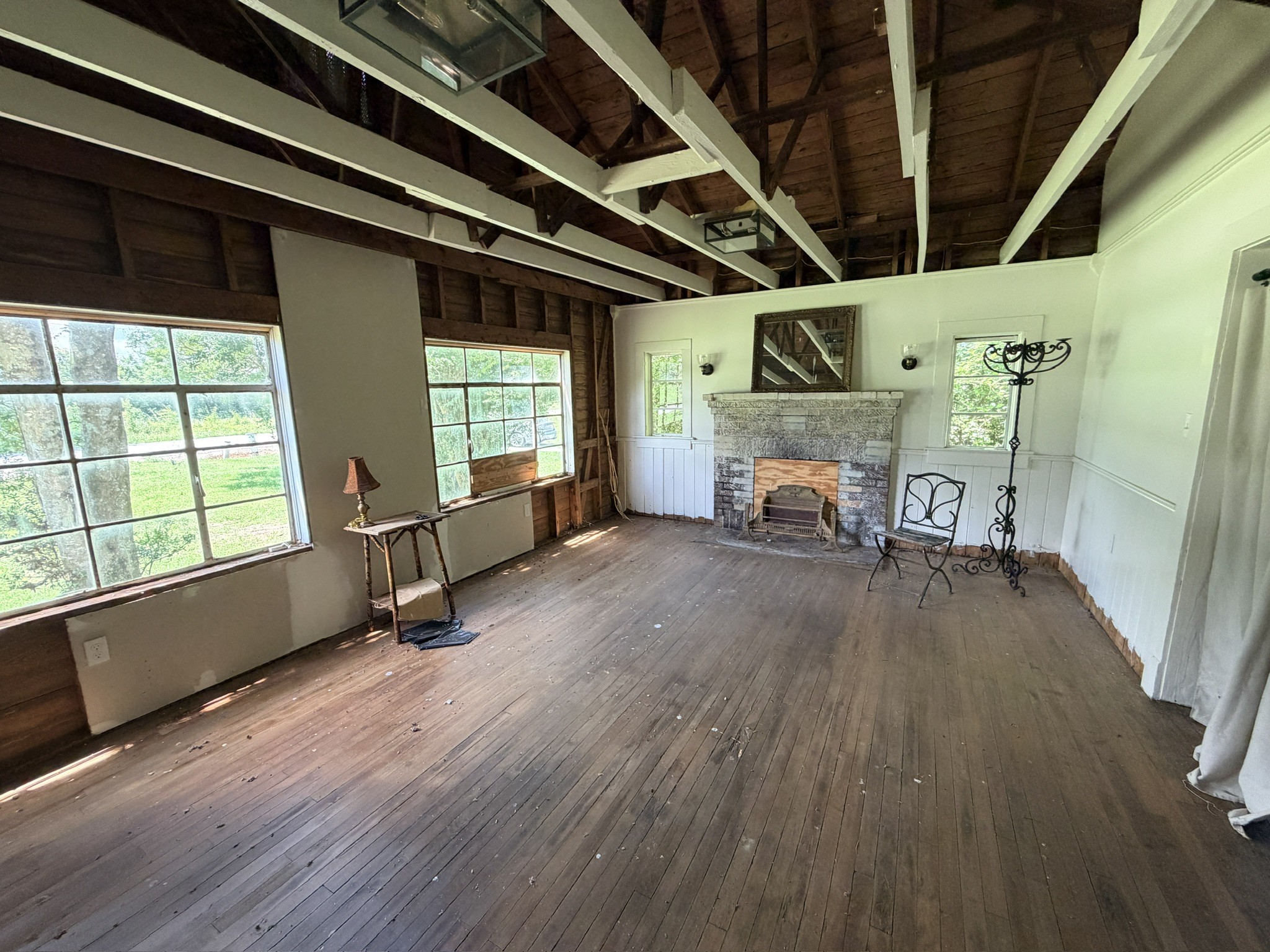 1687 Georgia Crossing Road Winchester, TN 37398 - Photo 28 of 38 a view of a livingroom with furniture hardwood floor and a ceiling fan