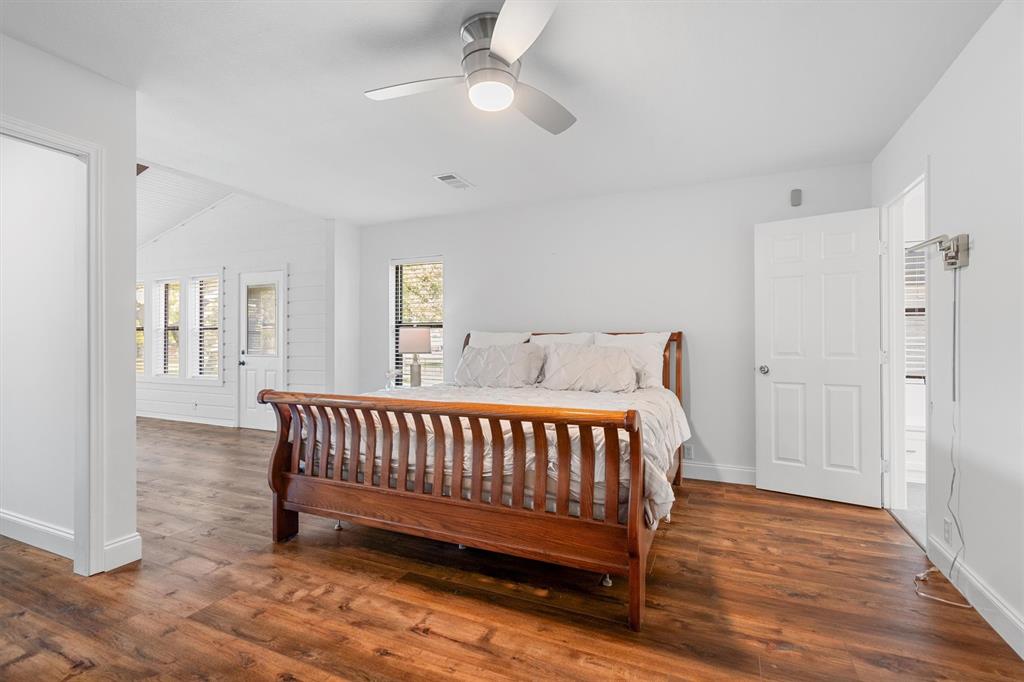 117 Modoc Trail Lake Kiowa, TX 76240 - Photo 12 of 40 LVP flooring and fresh paint makes a comfortable owners retreat.
