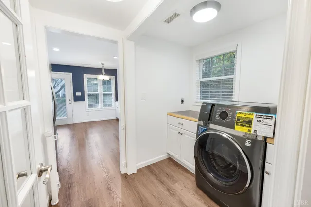 a view of a storage & utility room with washer and dryer