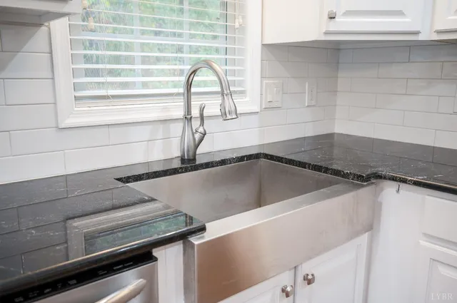 a close view of sink and washing machine