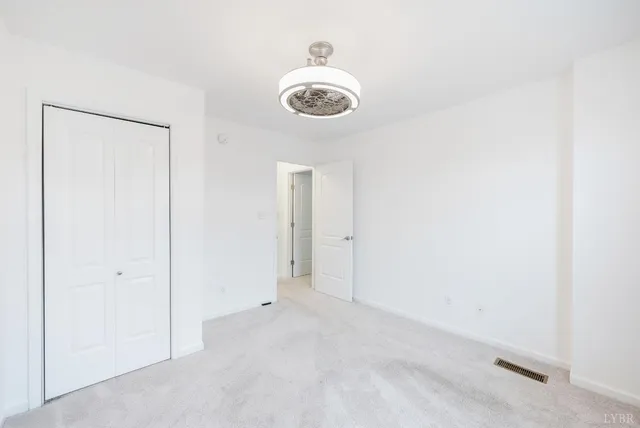 a view of a room with rack on the wall