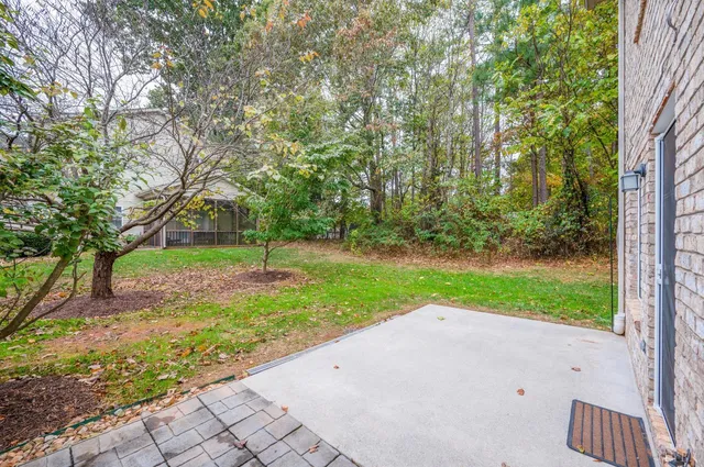 a view of a patio in backyard