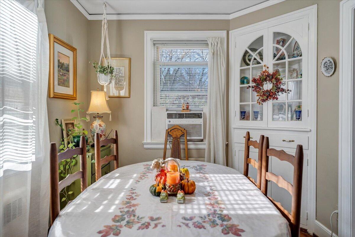 1909 Canterbury Road Southwest Roanoke, VA 24015 - Photo 13 of 65 a bedroom with a bed and a painting on the wall