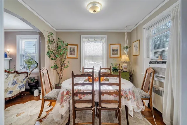 a bedroom with furniture and a book shelf