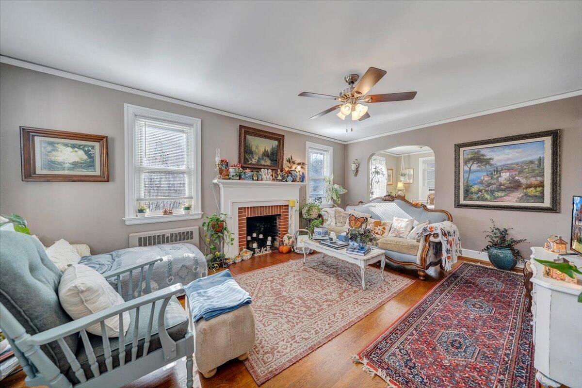1909 Canterbury Road Southwest Roanoke, VA 24015 - Photo 17 of 65 a living room with furniture fireplace and window