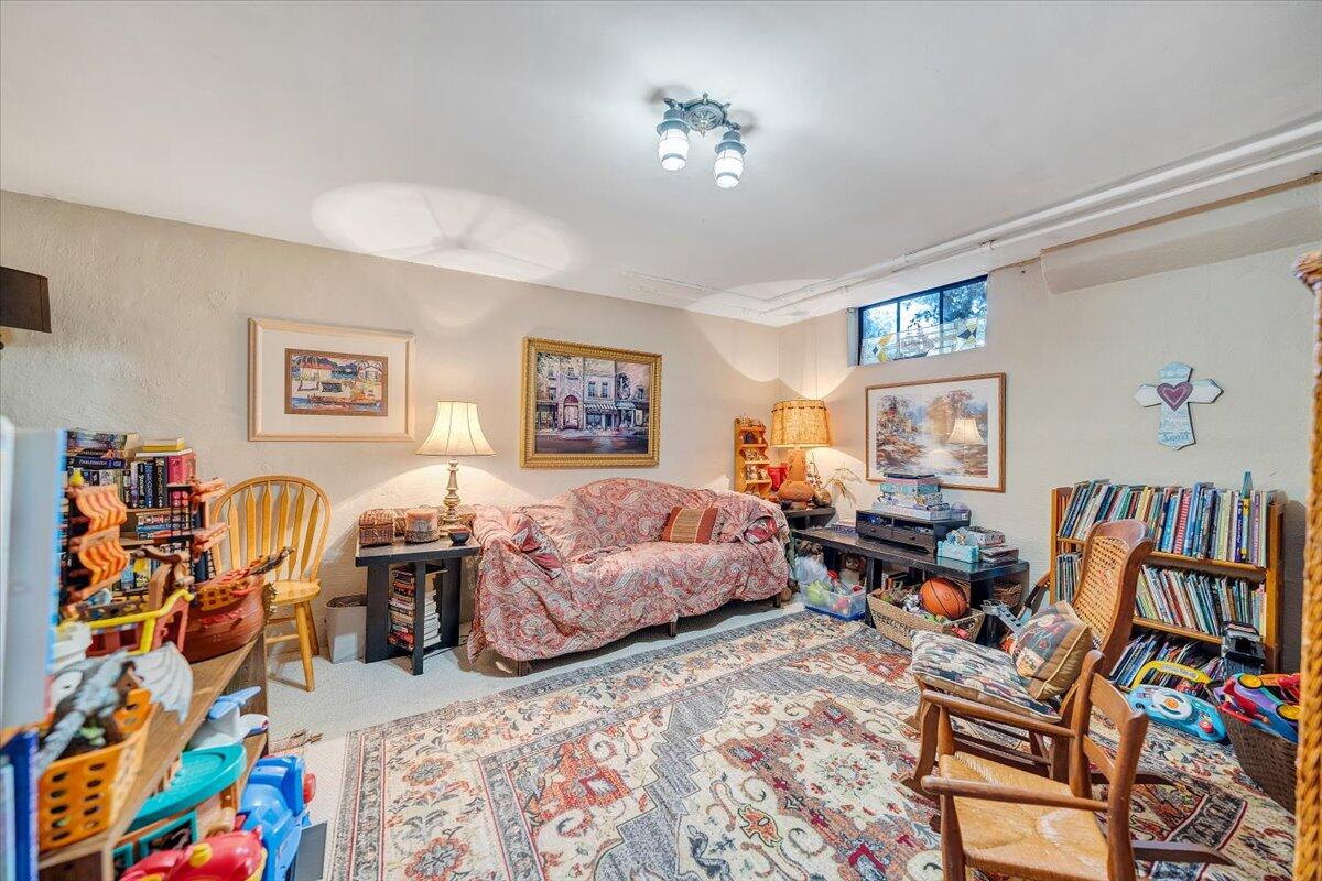 1909 Canterbury Road Southwest Roanoke, VA 24015 - Photo 19 of 65 a bedroom with furniture and a baby crib