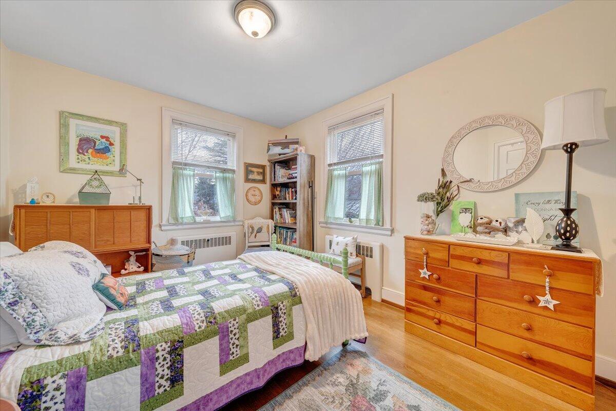 1909 Canterbury Road Southwest Roanoke, VA 24015 - Photo 33 of 65 a bedroom with a bed and wooden floor