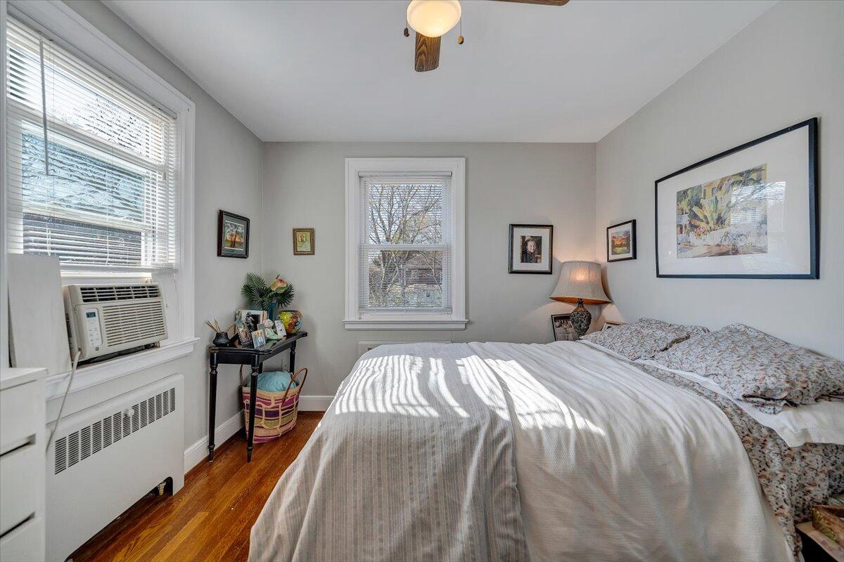 1909 Canterbury Road Southwest Roanoke, VA 24015 - Photo 36 of 65 a bedroom with a large bed and a chandelier