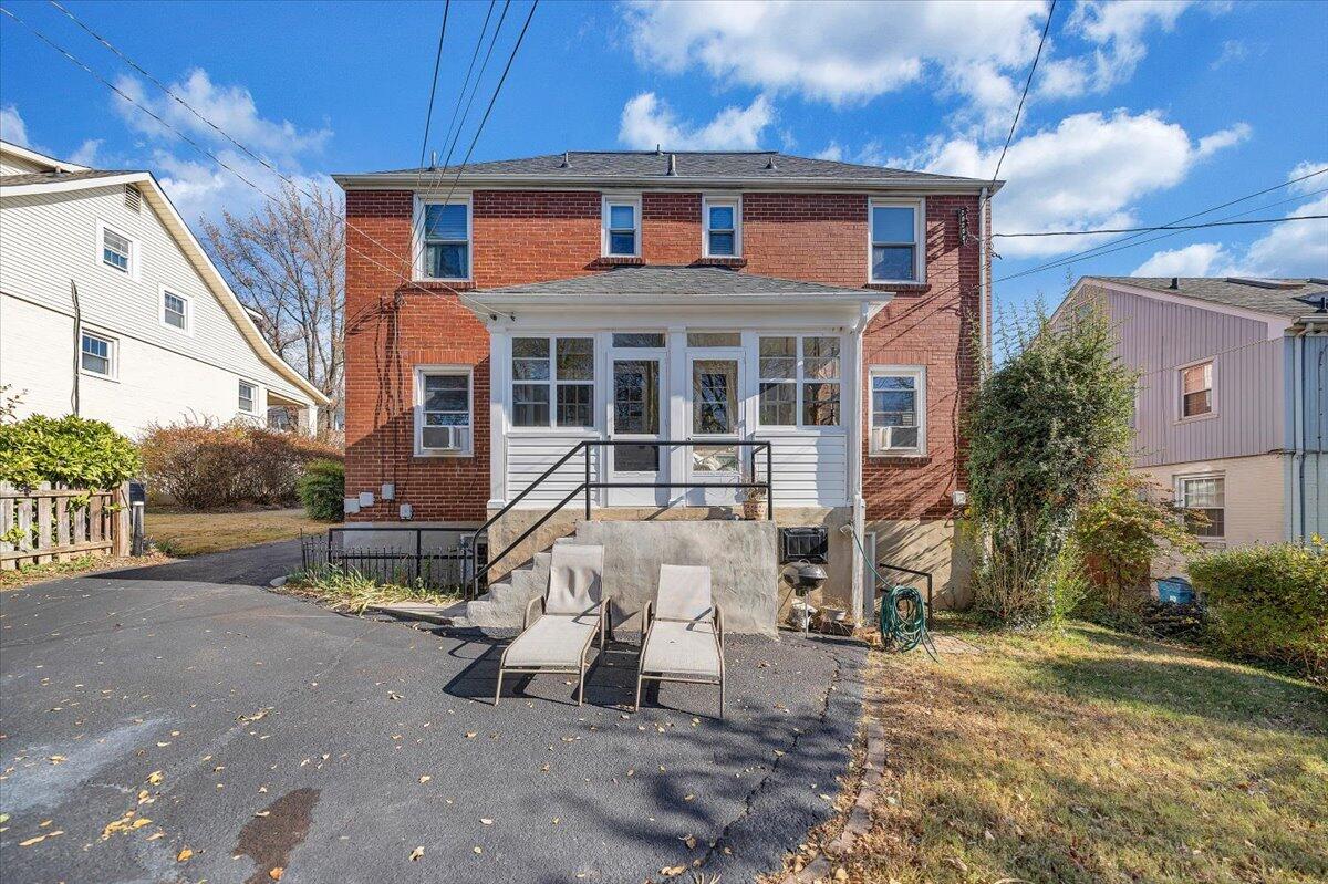 1909 Canterbury Road Southwest Roanoke, VA 24015 - Photo 49 of 65 a front view of a house with a yard