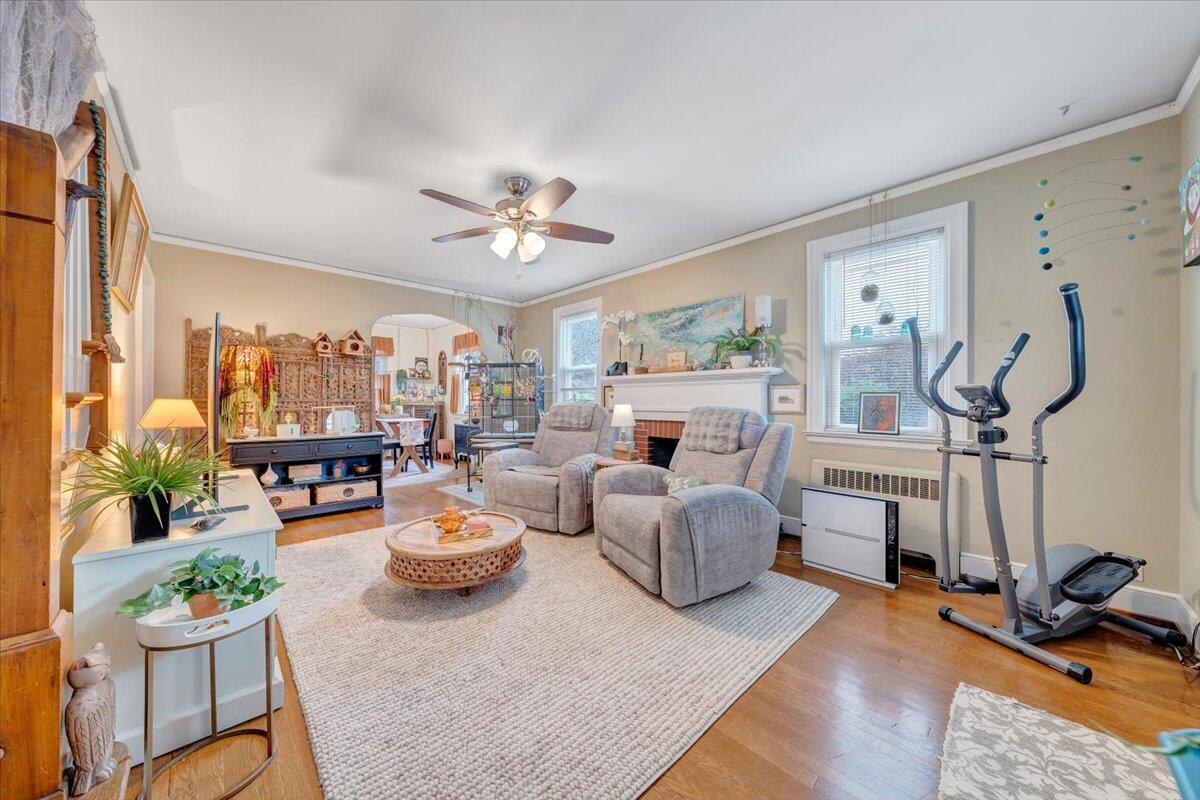 1909 Canterbury Road Southwest Roanoke, VA 24015 - Photo 6 of 65 a living room with furniture fireplace and a large window
