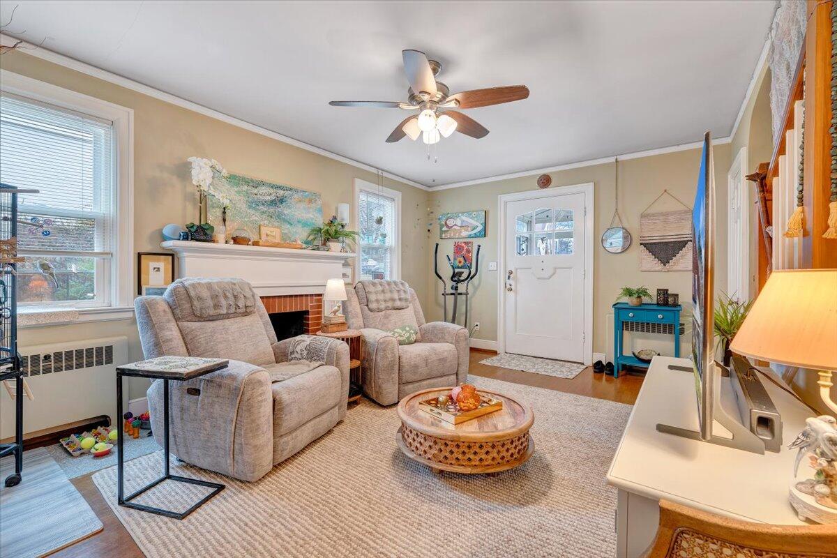 1909 Canterbury Road Southwest Roanoke, VA 24015 - Photo 7 of 65 a living room with furniture and a fireplace