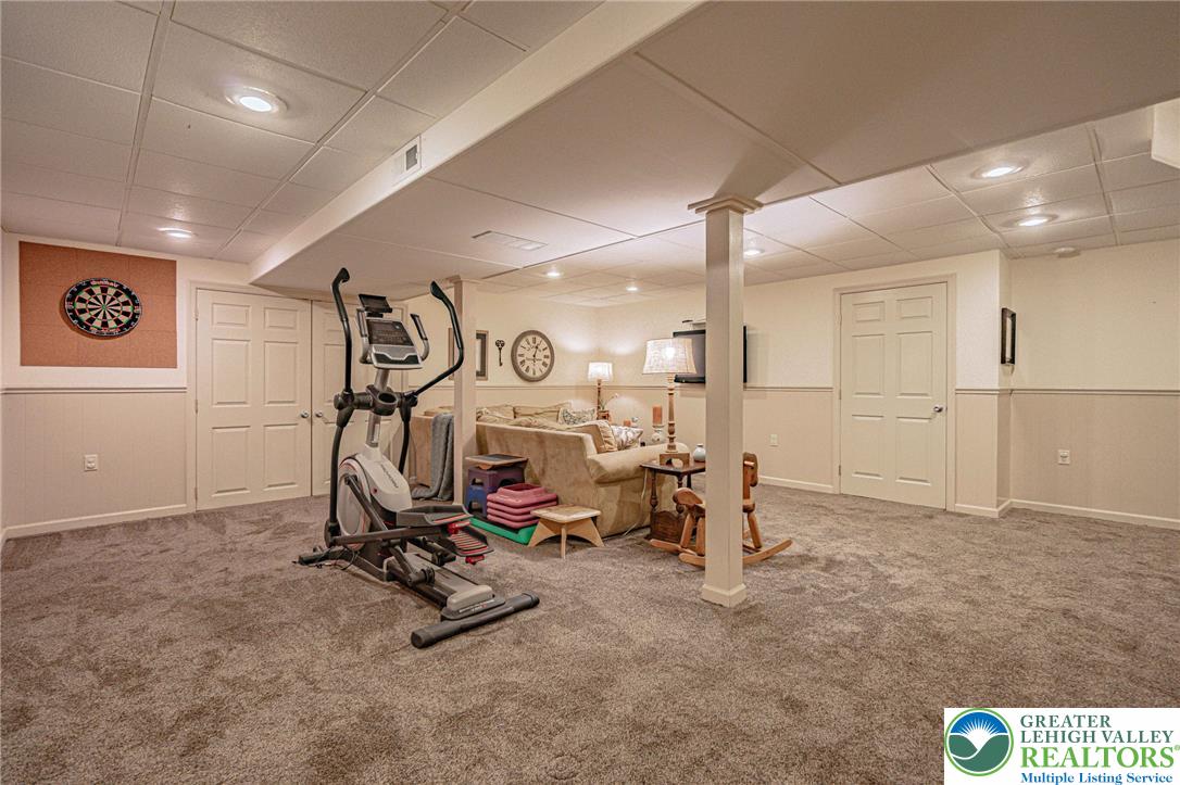 4542 Springfield Drive Coplay, PA 18037 - Photo 58 of 89 A versatile finished basement offers ample space for recreation and relaxation.