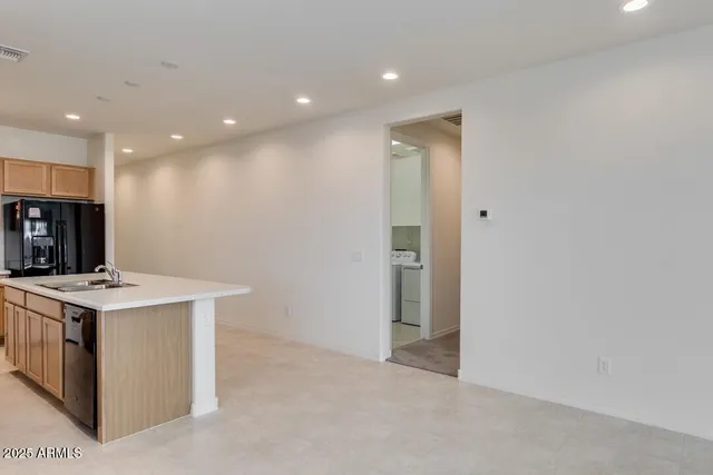 a view of a kitchen with a sink