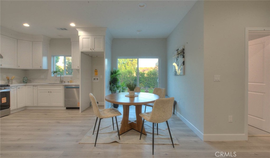 752 Rio Del Sol Avenue Montebello, CA 90640 - Photo 18 of 62 a kitchen with a table and chairs in it