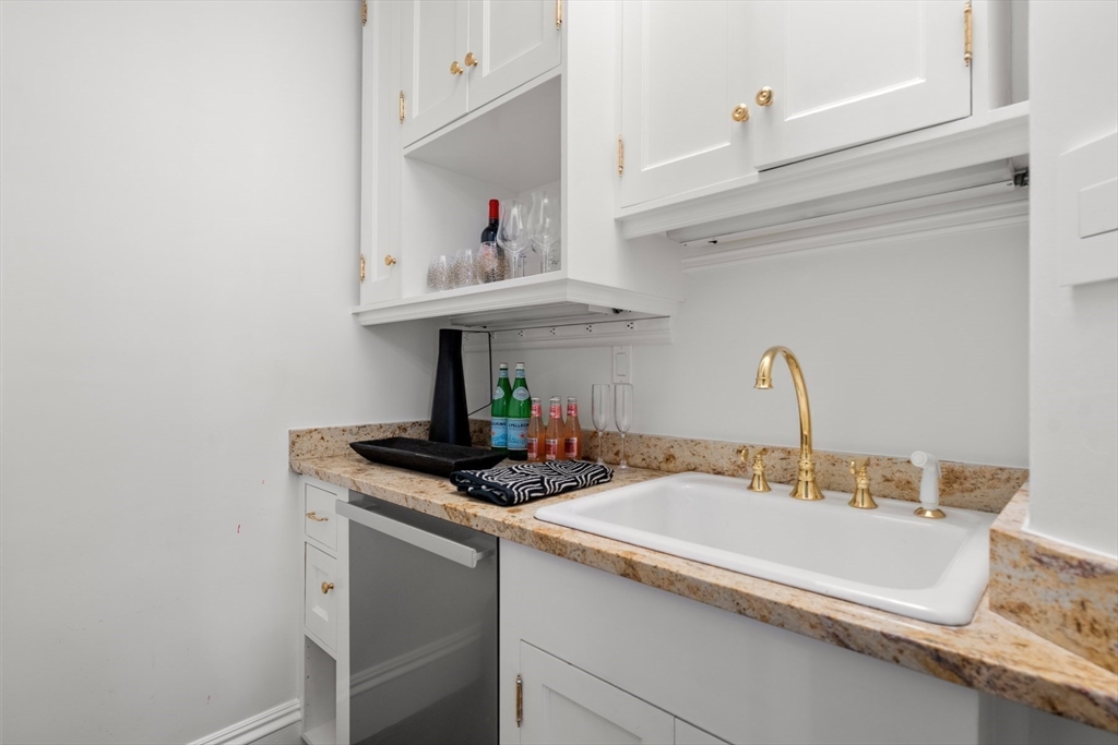 321 Beacon Street Boston, MA 02116 - Photo 12 of 34 a bathroom with a sink and a mirror