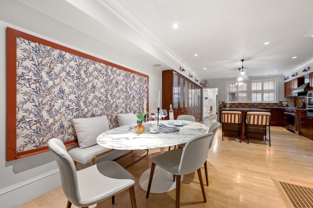 321 Beacon Street Boston, MA 02116 - Photo 16 of 34 a view of a dining room with furniture and a rug
