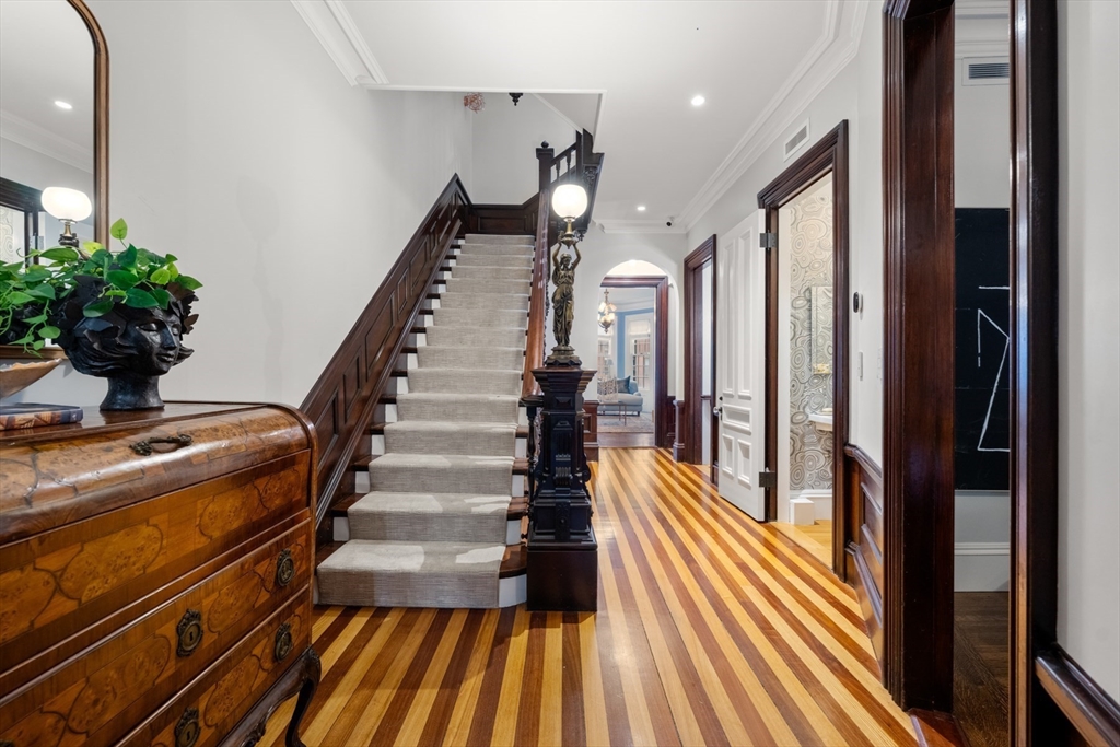 321 Beacon Street Boston, MA 02116 - Photo 2 of 34 a view of entryway and hall with wooden floor