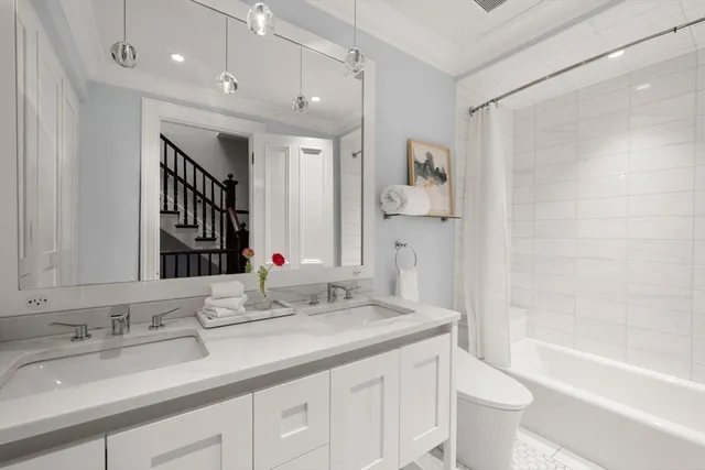 a bedroom with furniture and a fireplace