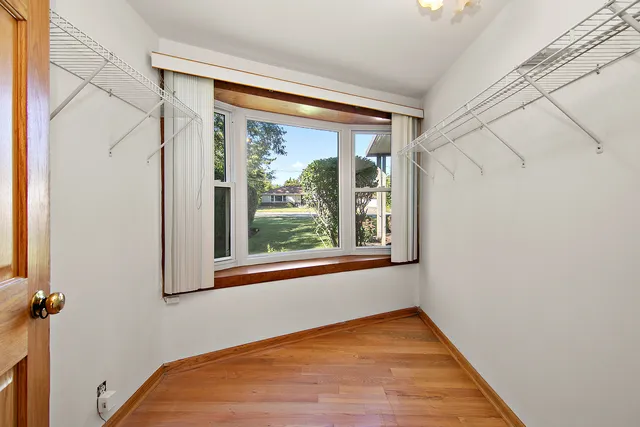 a view of a room with a large window