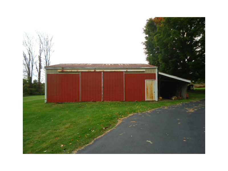 992 Sterrett Road Grove City, PA 16127 - Photo 21 of 25 Parking Lot/Garage. The 28x34 outbuilding has electric service.