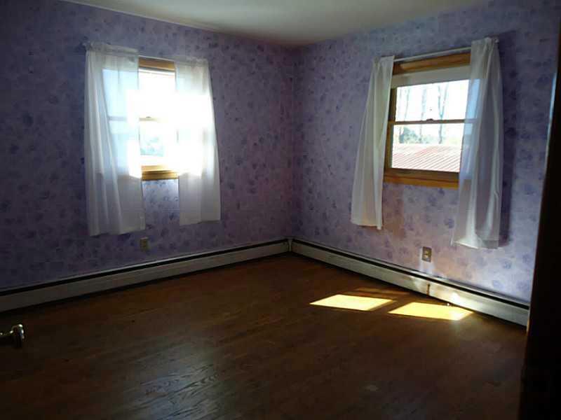 992 Sterrett Road Grove City, PA 16127 - Photo 9 of 25 Bedroom. Bedrooms 2 and 3 have double windows that overlook the field and fruit trees.