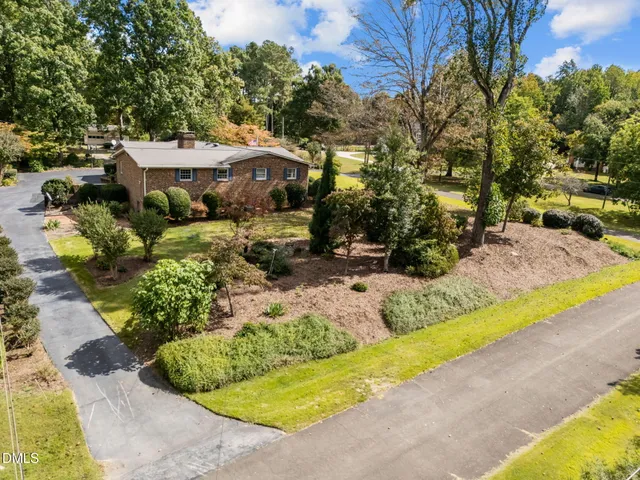 a view of a garden with an empty space
