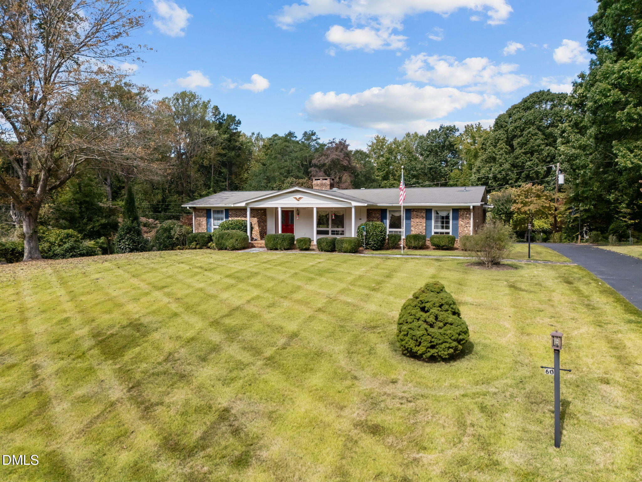60 Banbury Court Roxboro, NC 27573 - Photo 2 of 59 a view of a house with swimming pool and sitting area