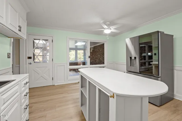 a view of a room with a large window