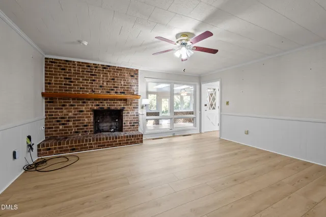a view of an empty room and window