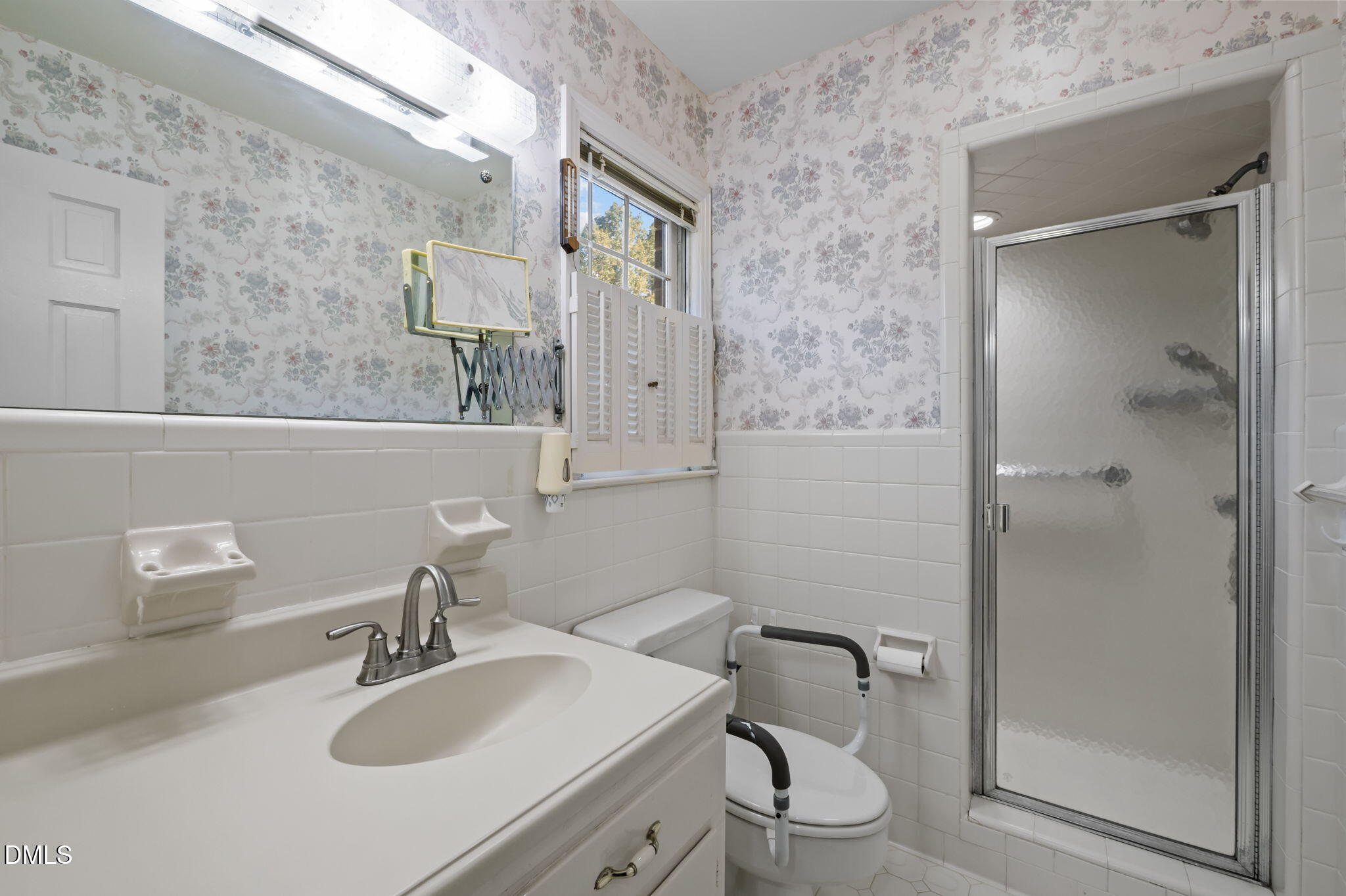 60 Banbury Court Roxboro, NC 27573 - Photo 39 of 59 a bathroom with a sink toilet and shower