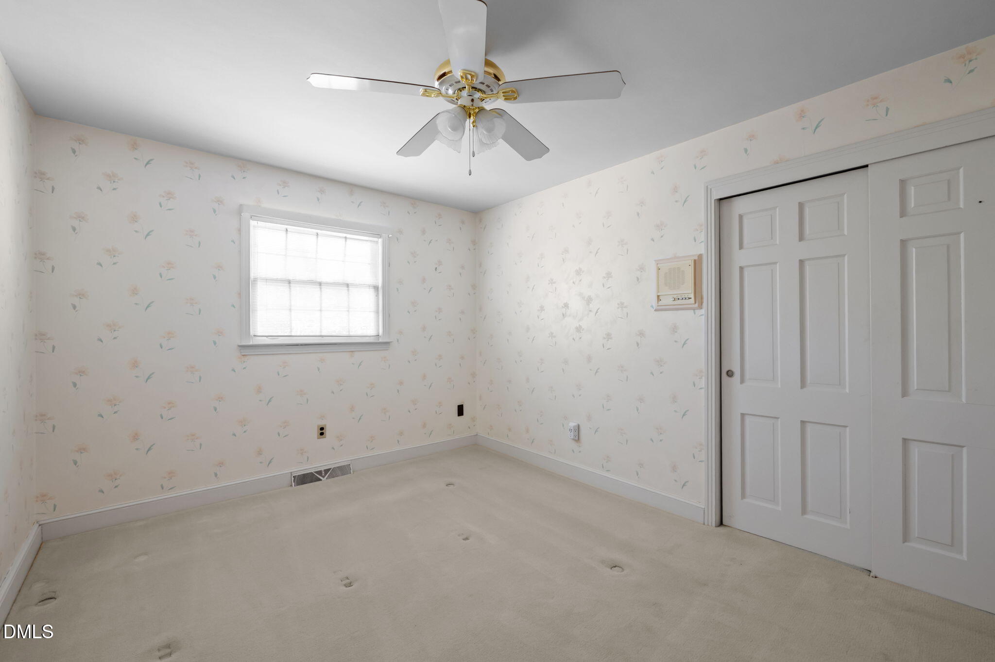 60 Banbury Court Roxboro, NC 27573 - Photo 43 of 59 an empty room with windows and fan