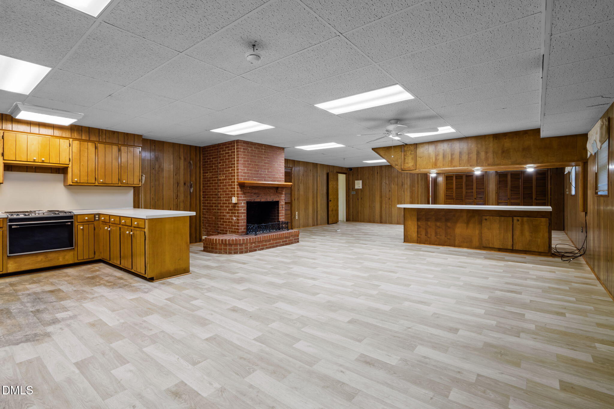 60 Banbury Court Roxboro, NC 27573 - Photo 52 of 59 a view of kitchen with furniture and a fireplace