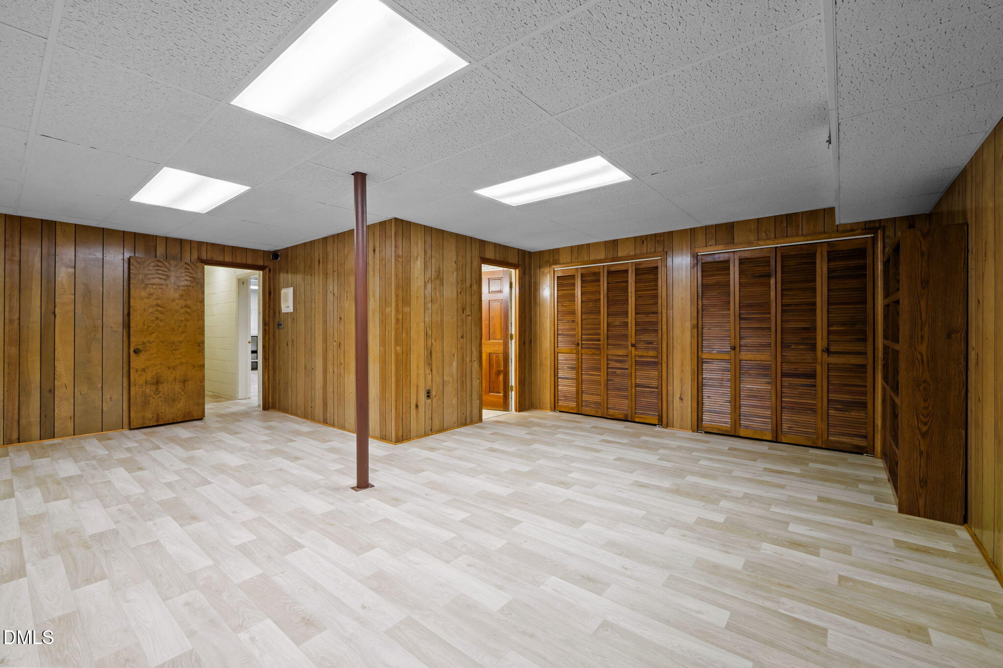60 Banbury Court Roxboro, NC 27573 - Photo 53 of 59 a view of an empty room with wooden floor
