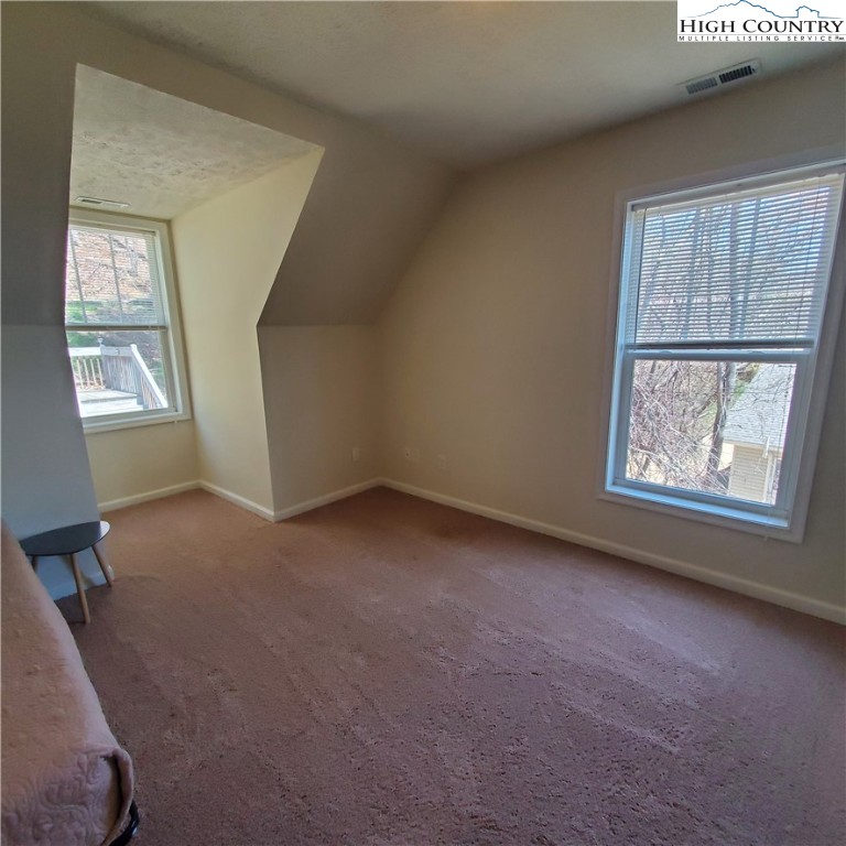 161 Alexander Drive Boone, NC 28607 - Photo 18 of 28 an empty room with windows
