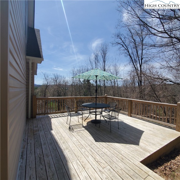 161 Alexander Drive Boone, NC 28607 - Photo 2 of 28 a view of a swimming pool with a patio