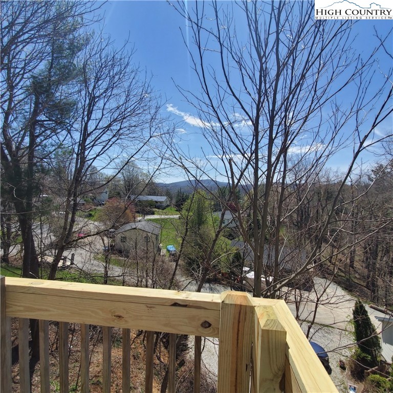 161 Alexander Drive Boone, NC 28607 - Photo 24 of 28 a view of a backyard with wooden fence