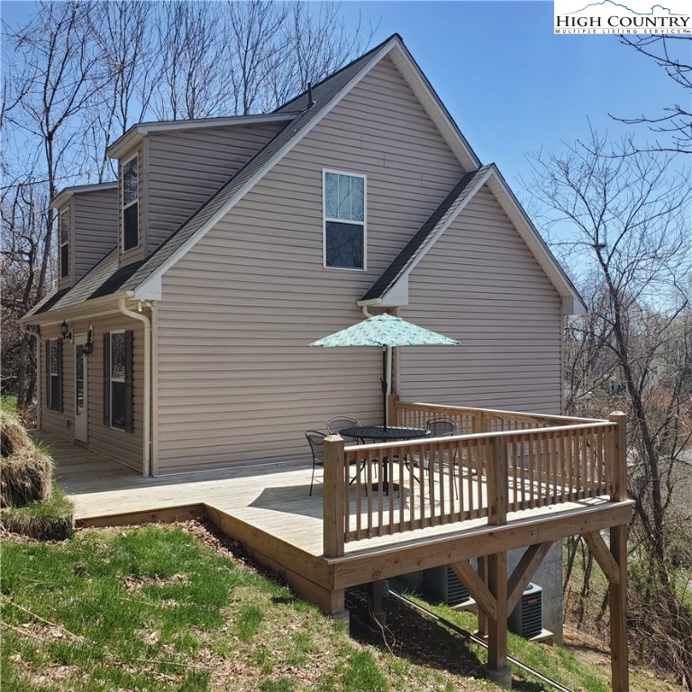 161 Alexander Drive Boone, NC 28607 - Photo 4 of 28 a front view of a house with garden